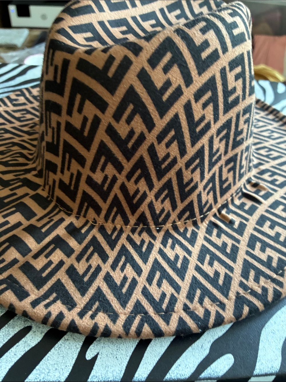 Brown and Black Hat